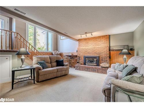 21 Doris Drive, Barrie, ON - Indoor Photo Showing Living Room With Fireplace