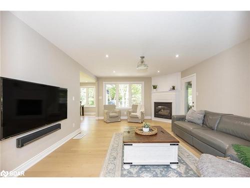 70 Copeland Creek Drive, Tiny, ON - Indoor Photo Showing Living Room With Fireplace