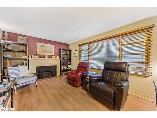 23 Shirley Avenue, Barrie, ON - Indoor Photo Showing Living Room With Fireplace