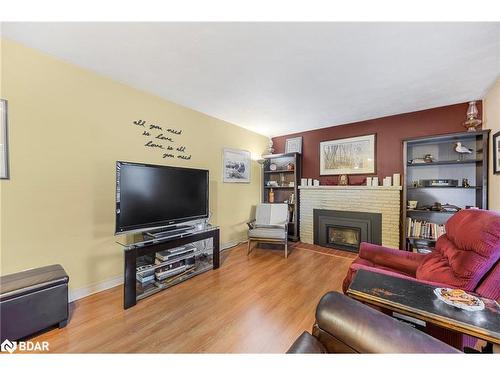 23 Shirley Avenue, Barrie, ON - Indoor Photo Showing Living Room With Fireplace