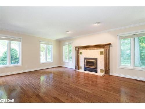 2087 Wilkinson Street, Innisfil, ON - Indoor Photo Showing Living Room With Fireplace