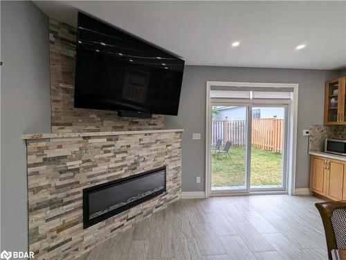 17 Middlebrook Road, Wasaga Beach, ON - Indoor Photo Showing Living Room With Fireplace