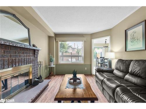 19 Peck Street, Barrie, ON - Indoor Photo Showing Living Room With Fireplace