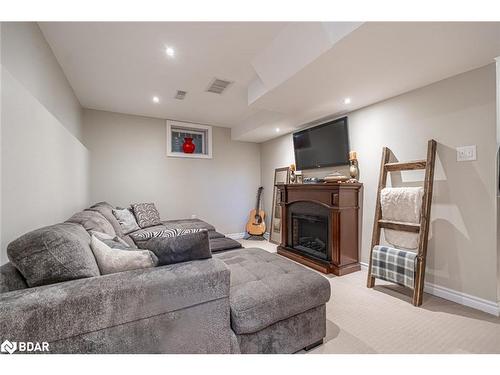 35 Bartor Boulevard, Barrie, ON - Indoor Photo Showing Basement With Fireplace