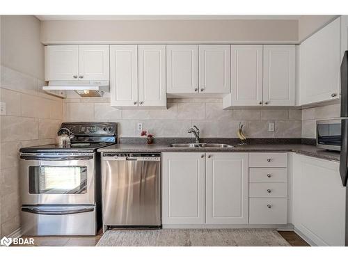 35 Bartor Boulevard, Barrie, ON - Indoor Photo Showing Kitchen With Double Sink