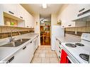 104-25 Meadow Lane, Barrie, ON  - Indoor Photo Showing Kitchen With Double Sink 