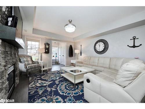 15 Carnoustie Lane, Port Severn, ON - Indoor Photo Showing Living Room With Fireplace