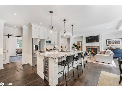 30 Black Creek Trail, Minesing, ON - Indoor Photo Showing Kitchen With Fireplace With Upgraded Kitchen