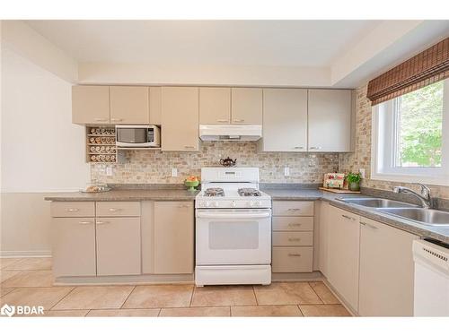 13 Daniele Avenue N, New Tecumseth, ON - Indoor Photo Showing Kitchen With Double Sink