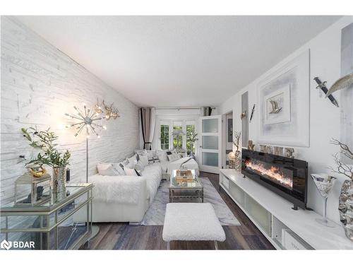 64 O'Shaughnessy Crescent, Barrie, ON - Indoor Photo Showing Living Room With Fireplace