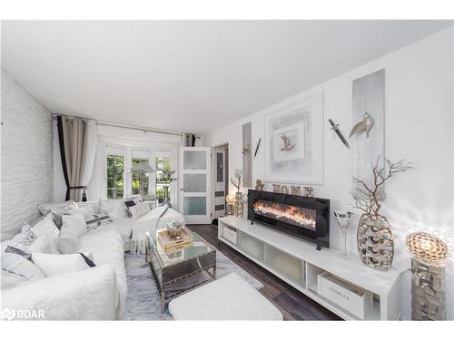 64 O'Shaughnessy Crescent, Barrie, ON - Indoor Photo Showing Living Room With Fireplace