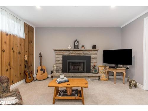 33 Roslyn Road, Barrie, ON - Indoor Photo Showing Living Room With Fireplace