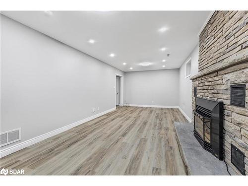 24 Dyer Boulevard, Barrie, ON - Indoor Photo Showing Other Room With Fireplace