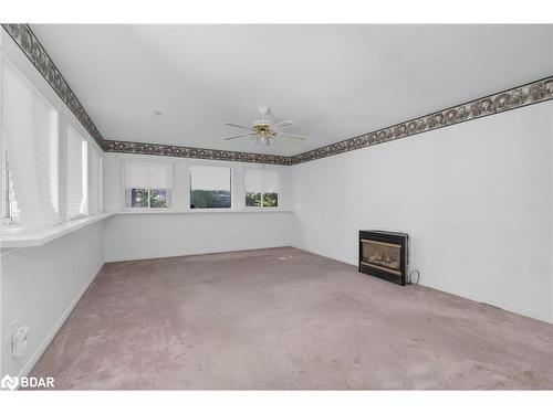 107 Henry Street, Barrie, ON - Indoor Photo Showing Other Room With Fireplace