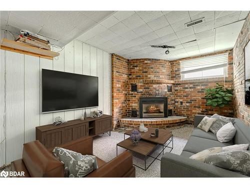 34 Strabane Avenue, Barrie, ON - Indoor Photo Showing Living Room With Fireplace