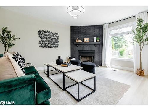 987 Garden Avenue, Innisfil, ON - Indoor Photo Showing Living Room With Fireplace