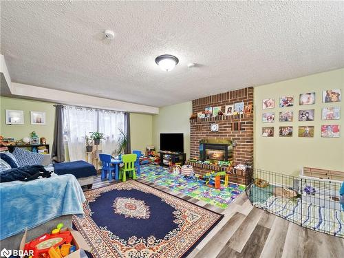 278 Anne Street N, Barrie, ON - Indoor Photo Showing Living Room With Fireplace