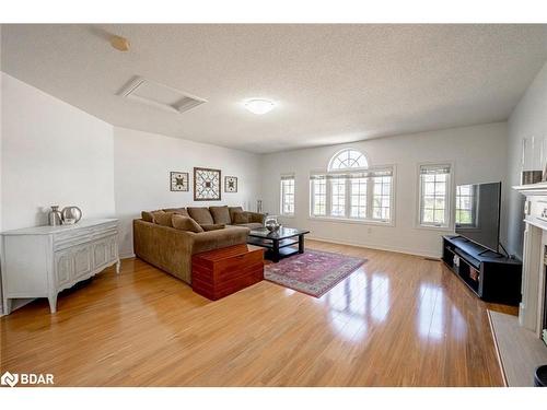 19 Serena Lane, Barrie, ON - Indoor Photo Showing Living Room With Fireplace