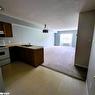 203-107 Bond Street, Orillia, ON  - Indoor Photo Showing Kitchen With Double Sink 