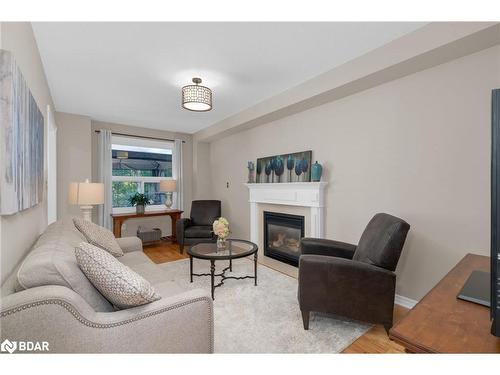 11 Hawkins Drive, Barrie, ON - Indoor Photo Showing Living Room With Fireplace