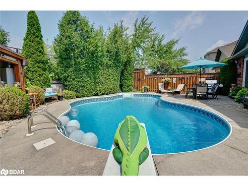 1205 Barnswallow Court, Peel, ON - Outdoor With In Ground Pool With Deck Patio Veranda With Backyard