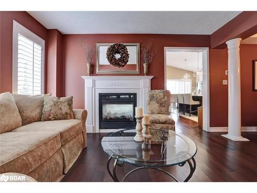 1205 Barnswallow Court, Peel, ON - Indoor Photo Showing Living Room With Fireplace