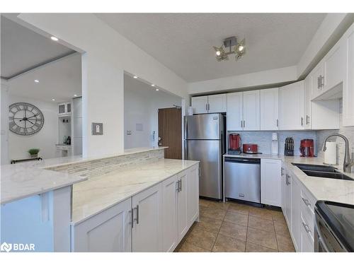 606-2301 Derry Road W, Mississauga, ON - Indoor Photo Showing Kitchen With Stainless Steel Kitchen With Double Sink