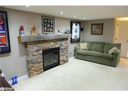 366 Cundles Road W, Barrie, ON - Indoor Photo Showing Living Room With Fireplace