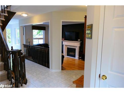 366 Cundles Road W, Barrie, ON - Indoor Photo Showing Other Room With Fireplace