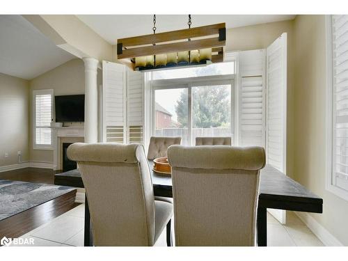 1388 Sheldon Street, Innisfil, ON - Indoor Photo Showing Dining Room With Fireplace