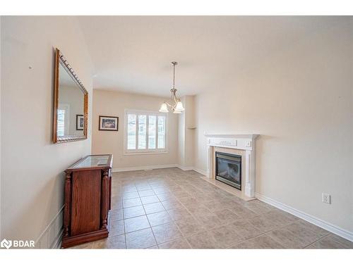 213 Dean Avenue, Barrie, ON - Indoor Photo Showing Living Room With Fireplace