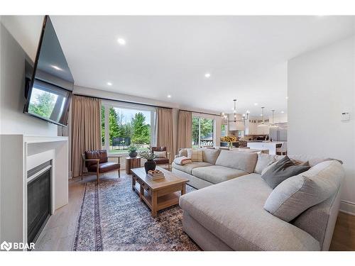 660 Mapleview Drive E, Innisfil, ON - Indoor Photo Showing Living Room With Fireplace