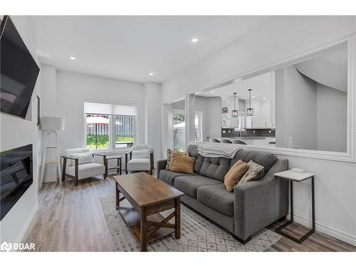 11 Black Ash Trail, Barrie, ON - Indoor Photo Showing Living Room With Fireplace