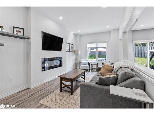 11 Black Ash Trail, Barrie, ON - Indoor Photo Showing Living Room With Fireplace