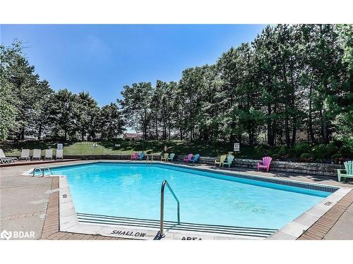 803-20 Cherrytree Drive, Brampton, ON - Outdoor With In Ground Pool With Backyard