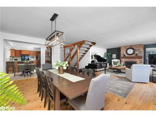 238 Robins Point Road, Victoria Harbour, ON - Indoor Photo Showing Dining Room With Fireplace