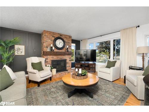 238 Robins Point Road, Victoria Harbour, ON - Indoor Photo Showing Living Room With Fireplace