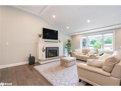 1171 North Shore Drive, Innisfil, ON - Indoor Photo Showing Living Room With Fireplace