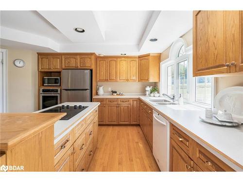 1331 Flos Road 3 E, Springwater, ON - Indoor Photo Showing Kitchen With Double Sink