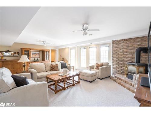 1331 Flos Road 3 E, Springwater, ON - Indoor Photo Showing Living Room With Fireplace