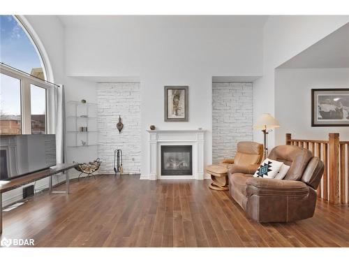 23 Christy Drive, Wasaga Beach, ON - Indoor Photo Showing Living Room With Fireplace