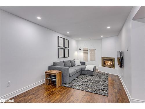 9 Lindsay Court, Barrie, ON - Indoor Photo Showing Living Room With Fireplace