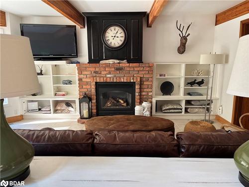 49 Glenwood Drive, Huntsville, ON - Indoor Photo Showing Living Room With Fireplace