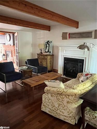 49 Glenwood Drive, Huntsville, ON - Indoor Photo Showing Living Room With Fireplace