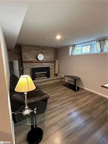 101 Steel Street, Barrie, ON - Indoor Photo Showing Basement With Fireplace