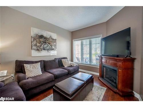 19 Serena Lane, Barrie, ON - Indoor Photo Showing Living Room With Fireplace