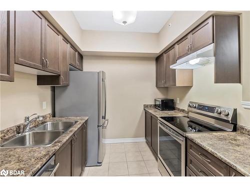 308-45 Ferndale Drive S, Barrie, ON - Indoor Photo Showing Kitchen With Double Sink