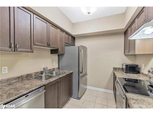 308-45 Ferndale Drive S, Barrie, ON - Indoor Photo Showing Kitchen With Double Sink