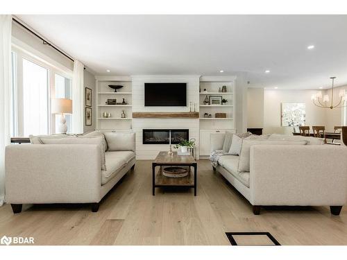 66 Finlay Mill Road, Midhurst, ON - Indoor Photo Showing Living Room With Fireplace