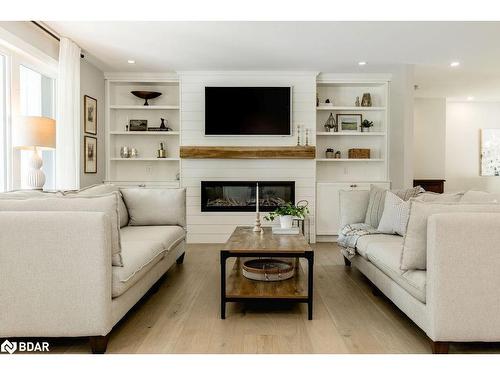 66 Finlay Mill Road, Midhurst, ON - Indoor Photo Showing Living Room With Fireplace